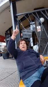 Angry Woman Dramatically Points Upward