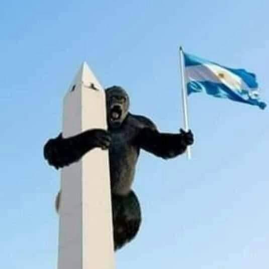 King Kong Scales Buenos Aires Obelisco With Flag