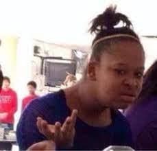 Girl Raises Hands in Total Confusion