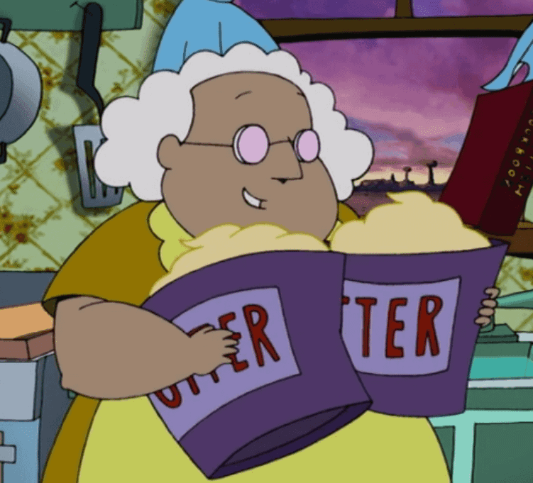 Muriel Proudly Holds Two Tubs of Butter