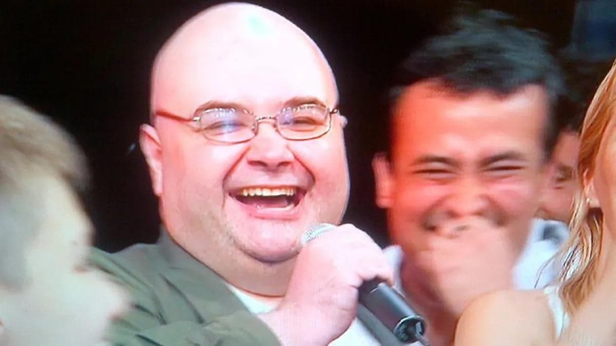 Bald Guy Laughing With Microphone