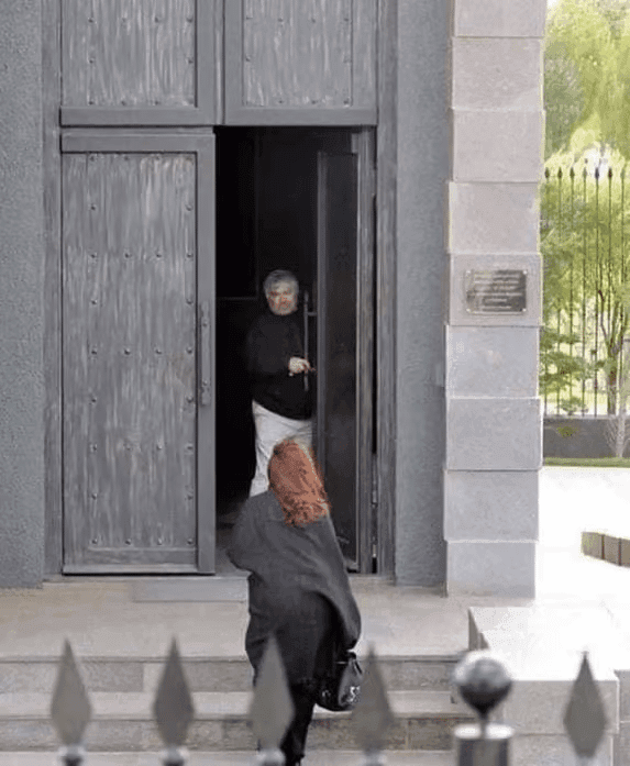 Person Kicking Door Open