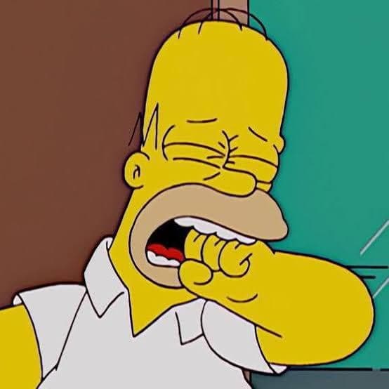 Homer Simpson Crying With Fist In Mouth